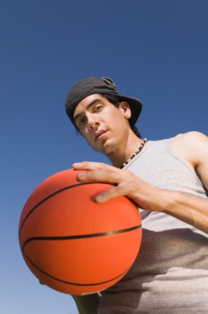 Young Man Holding Basketballの写真素材