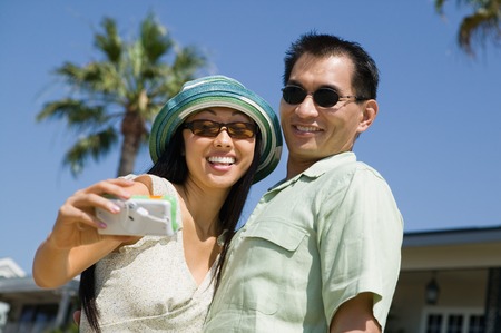 Couple Taking Their Own Photoの写真素材