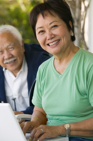 Woman Using Laptopの写真素材