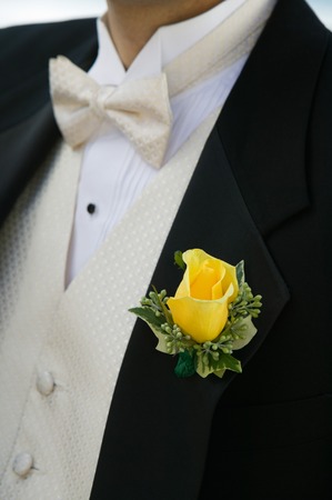Close-up of Yellow Rose on Groom's Tuxedoの写真素材