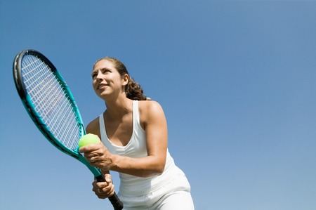 Tennis Player Preparing to Serveの写真素材