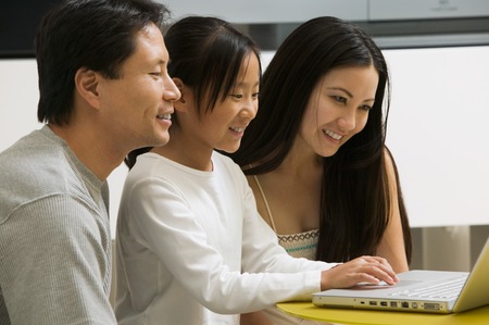 Family Using Laptopの写真素材