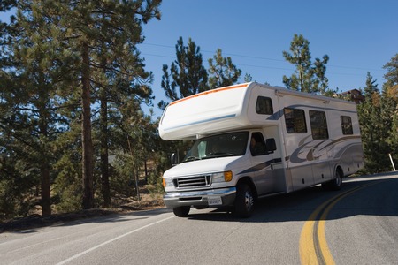 RV Driving on Mountain Roadの写真素材