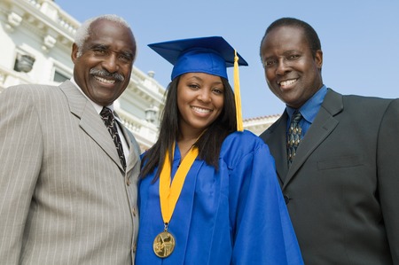 Graduate with Father and Grandfatherの写真素材