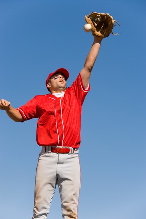 Outfielder Catching Baseball