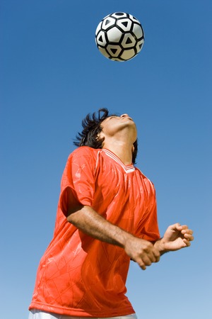 Soccer Player Heading Ballの写真素材