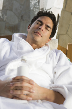 Man sleeping outdoorsの写真素材