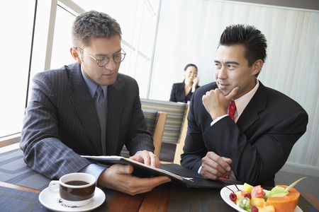 Two Businessmen in Lunch Meetingの写真素材