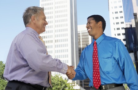 Businessmen Shaking Handsの写真素材