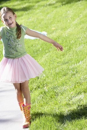 Young Girl Playing Outsideの写真素材
