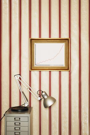 Office with Framed Graph Showing Upward Growthの写真素材