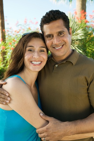 Couple outdoors front view portrait.の写真素材
