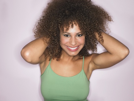 Woman with Curly Hair in studio half-length