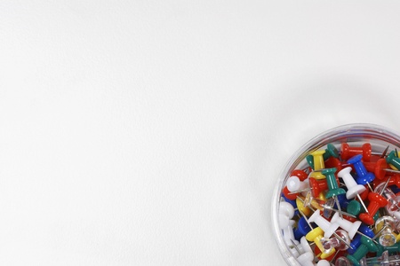 Container of Push Pins overhead view