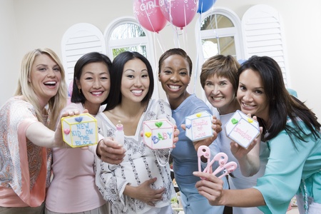 Pregnant Asian Woman with friends at a Baby Showerの写真素材