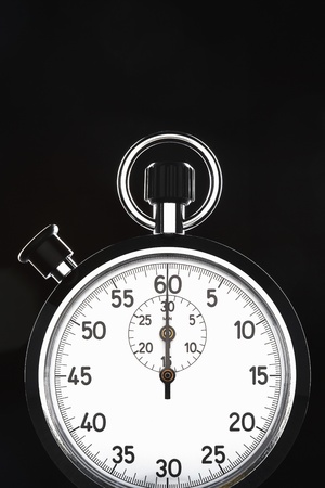 Stopwatch on black background studio shot