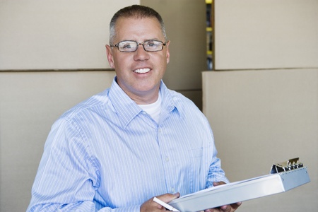 Man Holding Clipboard