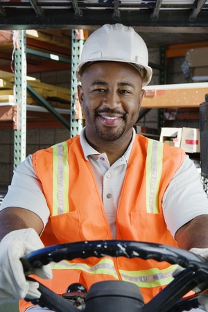 Man Driving a Forklift