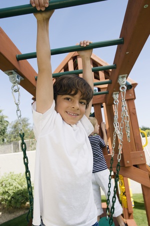 Little Boy on a Jungle Gymの写真素材