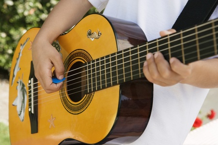 Little Boy Playing Guitar