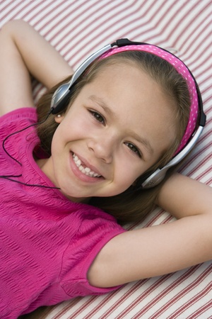 Little Girl Listening to Headphonesの写真素材