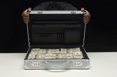 Briefcase Full of Moneyの写真素材
