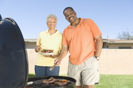 Couple at a barbequeの写真素材