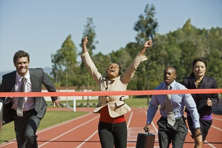 Business People Crossing the Winning Line
