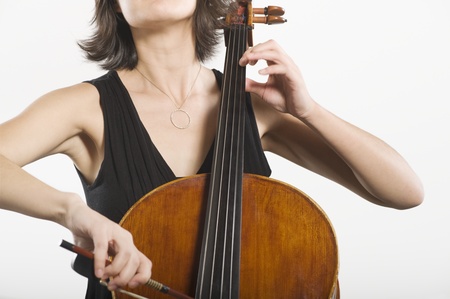 Mid section of female cellistの写真素材