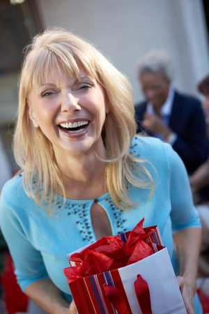 Smiling Woman with Shopping Bagsの写真素材
