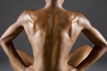 Back view of nude womanの写真素材