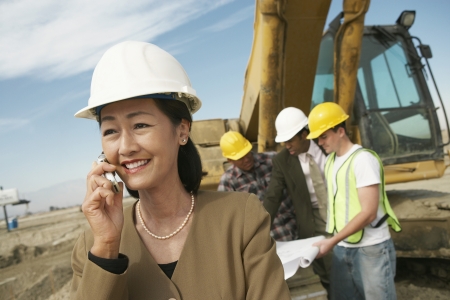 Surveyor Using Cell Phoneの写真素材