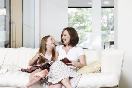 Mother and Daughter Reading Togetherの写真素材