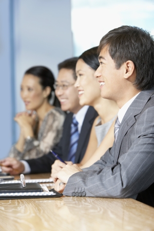 Businesspeople Listening to Speechの写真素材