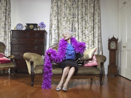 Senior Woman Sitting on Love Seatの写真素材