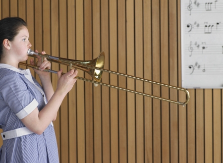 High School Student Practicing Tromboneの写真素材