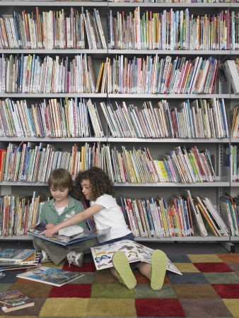 Boy and Girl with Picture Booksの写真素材