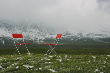 Chairs in Mountain Landscapeの写真素材