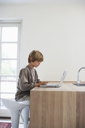 Boy on Laptopの写真素材
