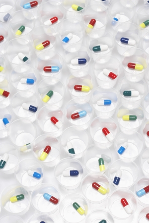 Capsule pills in plastic cupsの写真素材
