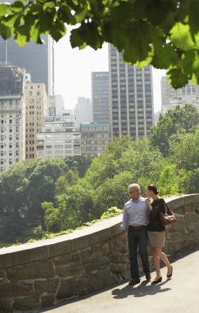 Couple walking in parkの写真素材