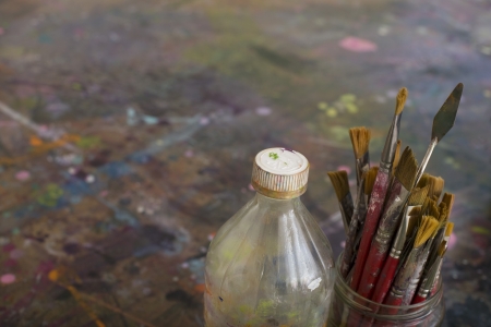 Artist's Paint Brushes and Bottle by Paletteの写真素材