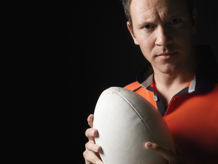 Rugby Player Holding Ballの写真素材
