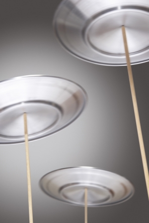 Plates Spinning on Sticksの写真素材