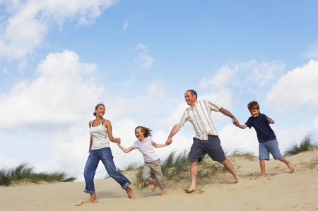 Vacationing Family at Beachの写真素材