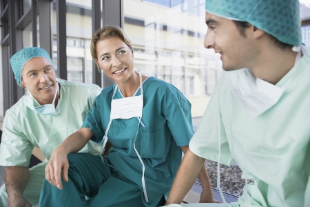 Doctors Talking in Corridor