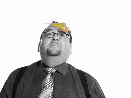 Businessman with Egg on his Faceの写真素材