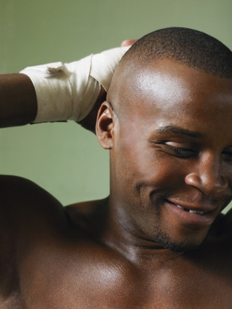 Boxer with hand on head close-upの写真素材
