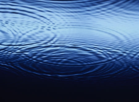 Ripples overlapping on Water close-upの写真素材