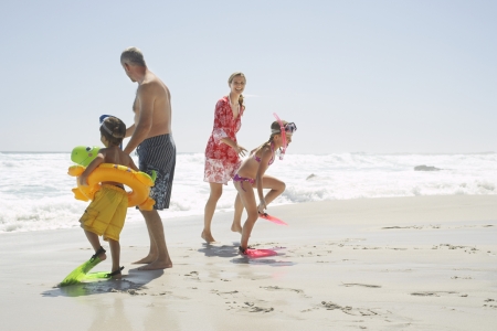 Family Playing on Beachの写真素材